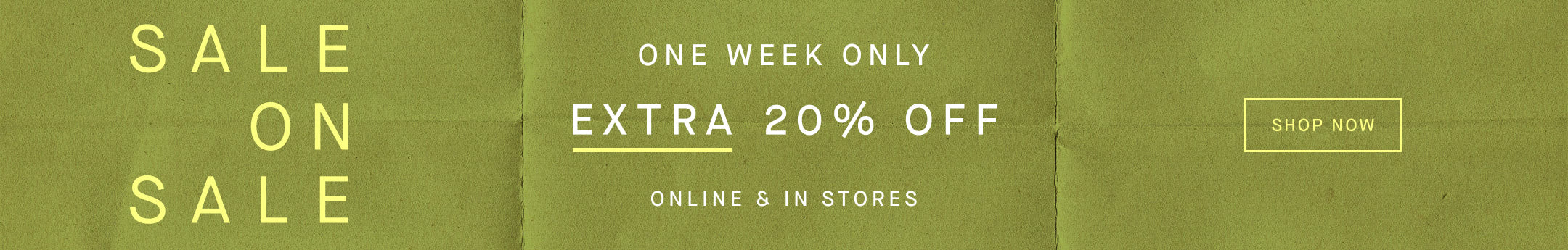 Sale sign with 'SALE ON SALE' and 'EXTRA 20% OFF' text on a green background