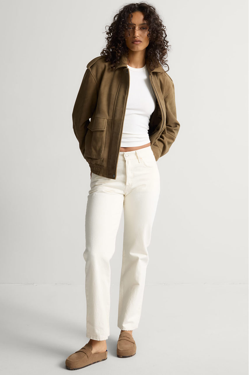 Model wearing The Penny Clog in ReVelvet Portobello.