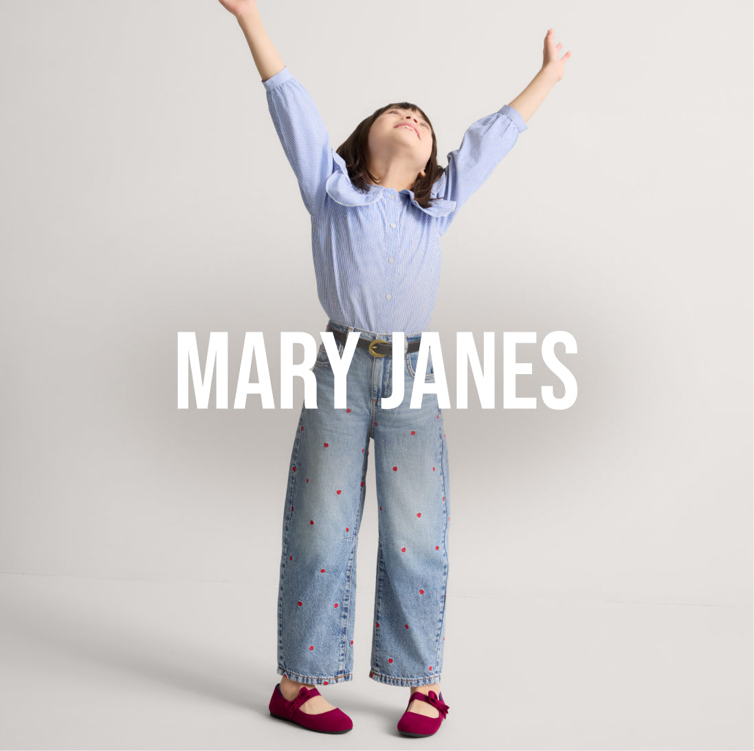 Child wearing The Kids Tux Bow Mary Jane in Revelvet Ruby, with text overlay ' Mary Janes' 