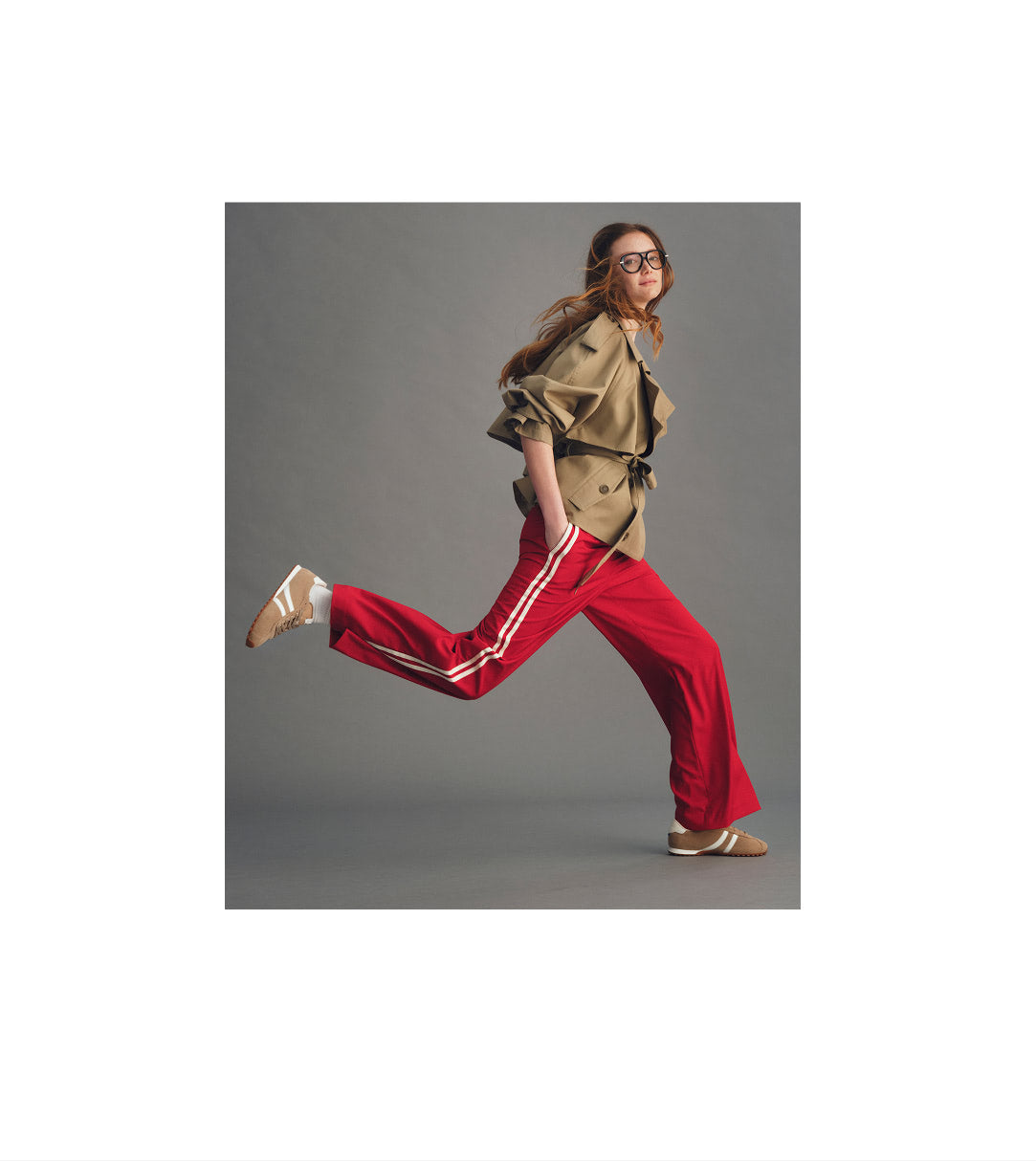 A model wearing The Ivy Sneaker in ReVelvet Wren.