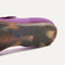 The sole of The Square Mary Jane in Plum shown in diagonal view. 
