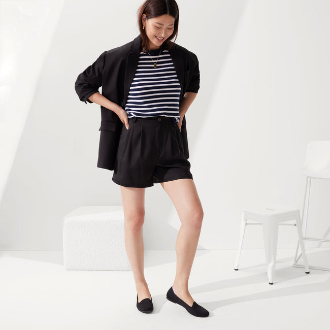 Alternate view of a model wearing The Lounge Loafer in Black.