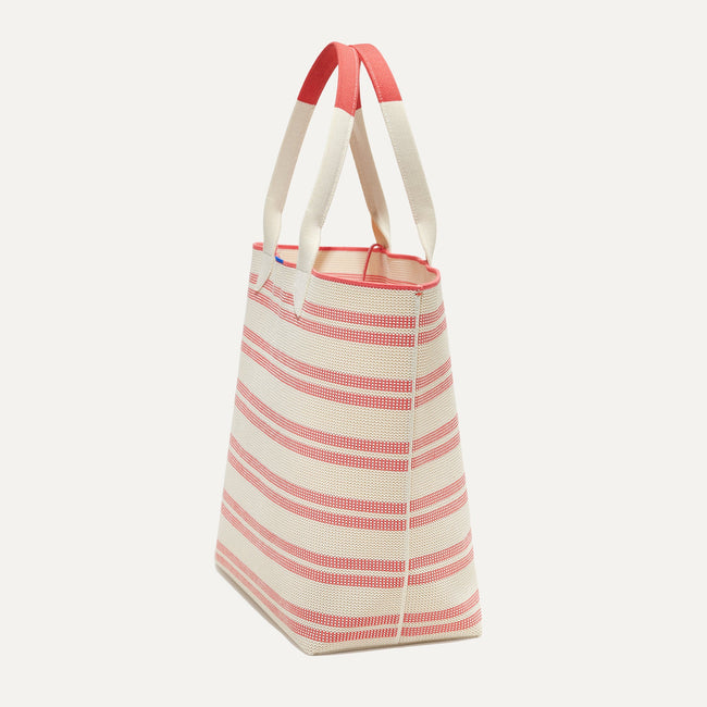 The Lightweight Tote in Coral Stripe shown in diagonal view.
