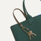 Close up of the handles and key leash detail of The Lightweight Tote in Rainstorm Green. 