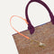 The Lightweight Tote in Revive Mélange shown with its handy key leash. 