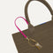 Close up of the handles and key leash detail of The Lightweight Tote in Safari Crochet. 