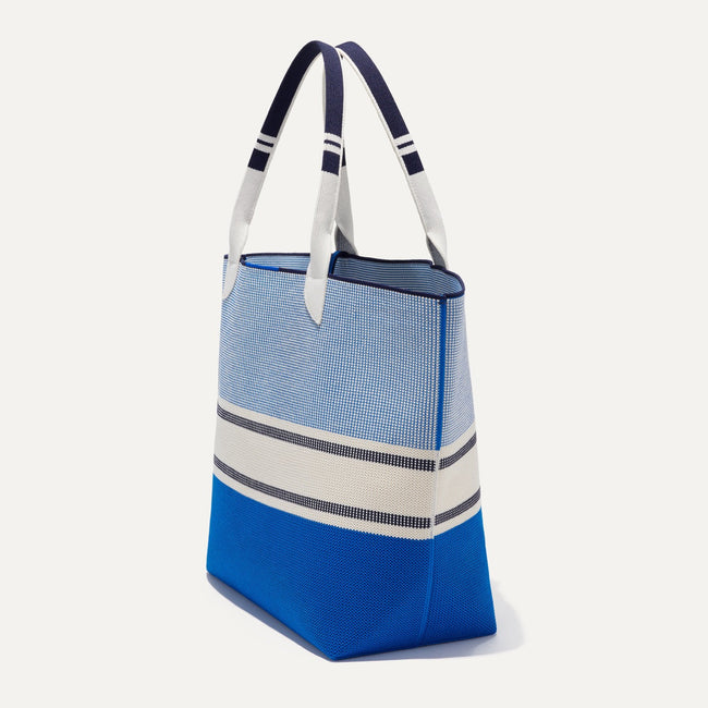 The Lightweight Tote in Sailboat Blue shown in diagonal view. 