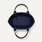 The Lightweight Tote in Sapphire and Onyx shown open from the top, with base insert visible. 