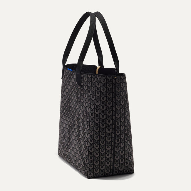 The Lightweight Tote in Signature Black shown in diagonal view.