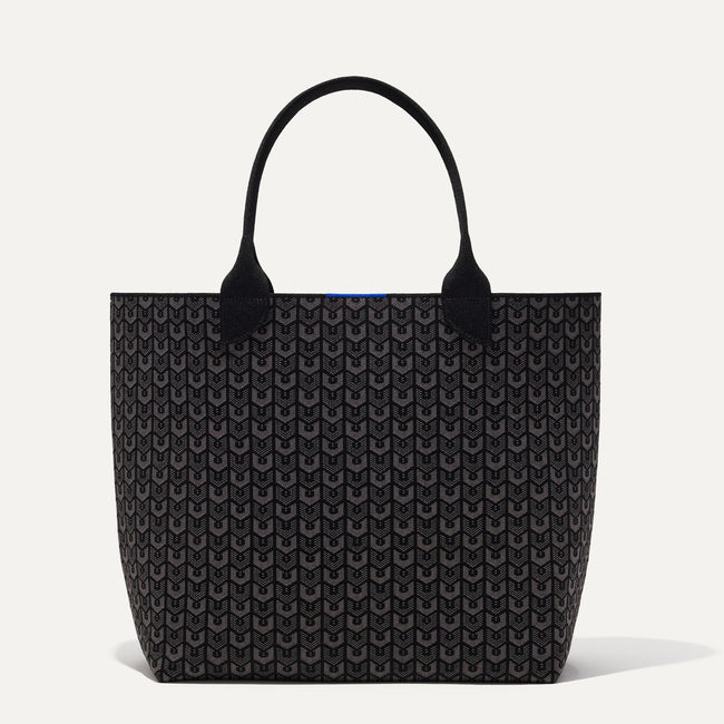 The Lightweight Tote in Signature Black shown from the front. 