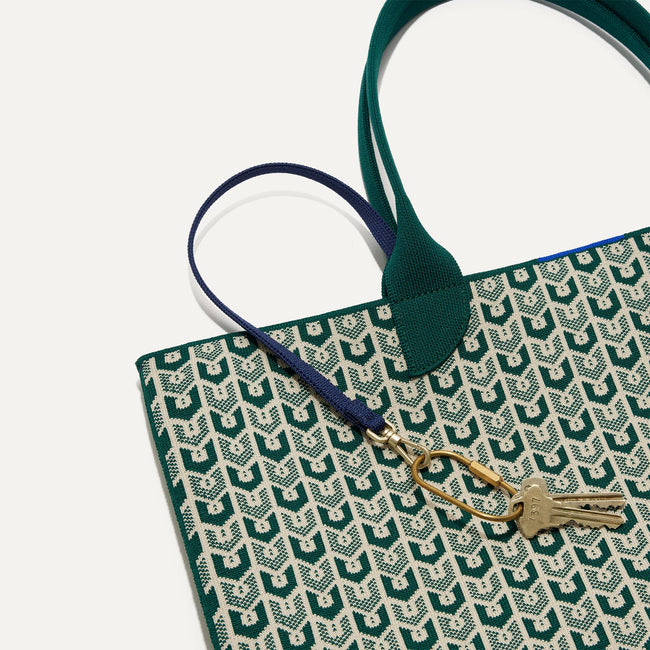 The Valentino V logo Signature Handbag: A Symbol of Italian Luxury –  LuxUness