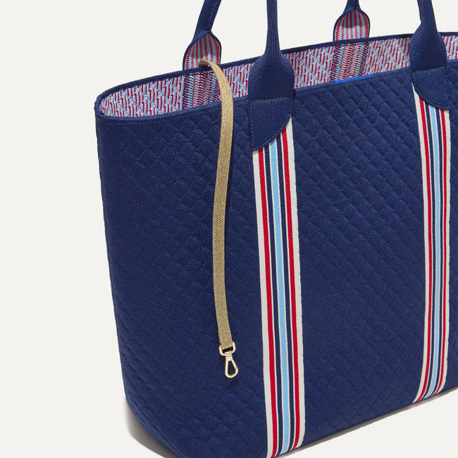 The Lightweight Tote in Spirit Stripe shown with its handy key leash. 
