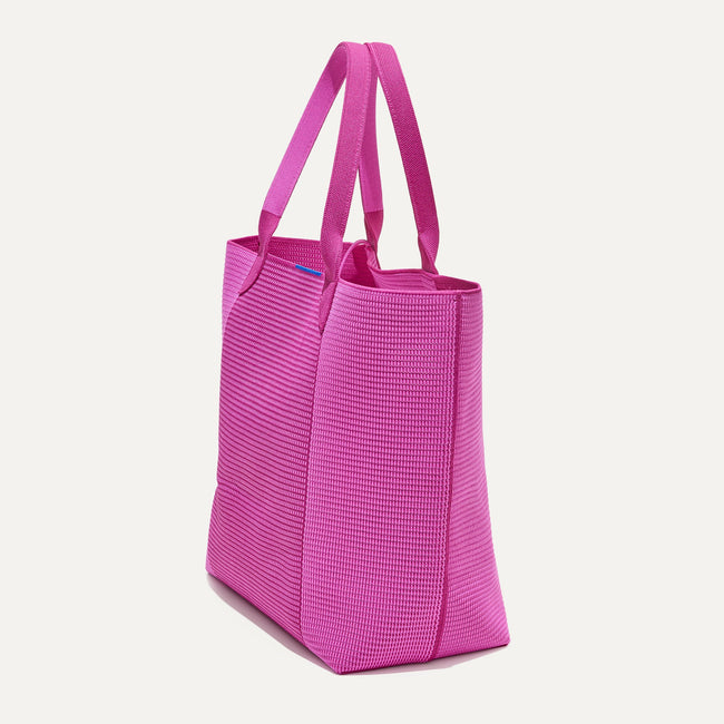 The Lightweight Tote in Tulip Pink Colorblock shown in diagonal view.