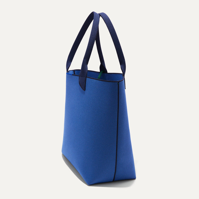 The Lightweight Tote in Varsity Blue shown in diagonal view.