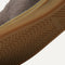 Close up of the outsoles of The Merino RS01 Sneaker in Timber Brown, with raised grooves for added traction.