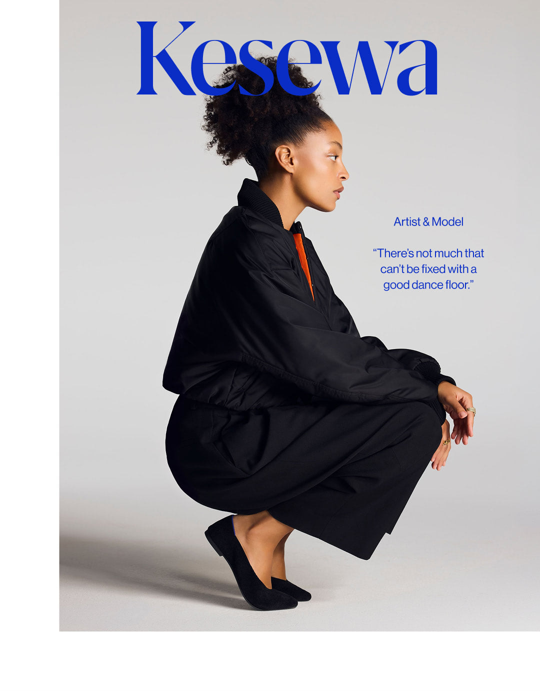 A fashion editorial-style photo with the word Kesewa in large blue text at the top. Woman wearing The Point III in Black.