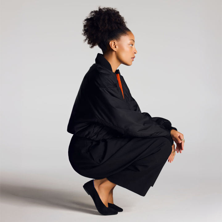 Model wearing The Point III in Black.