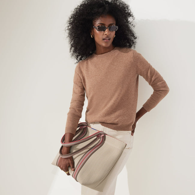 The Essential Tote in Sunkissed worn by a model.
