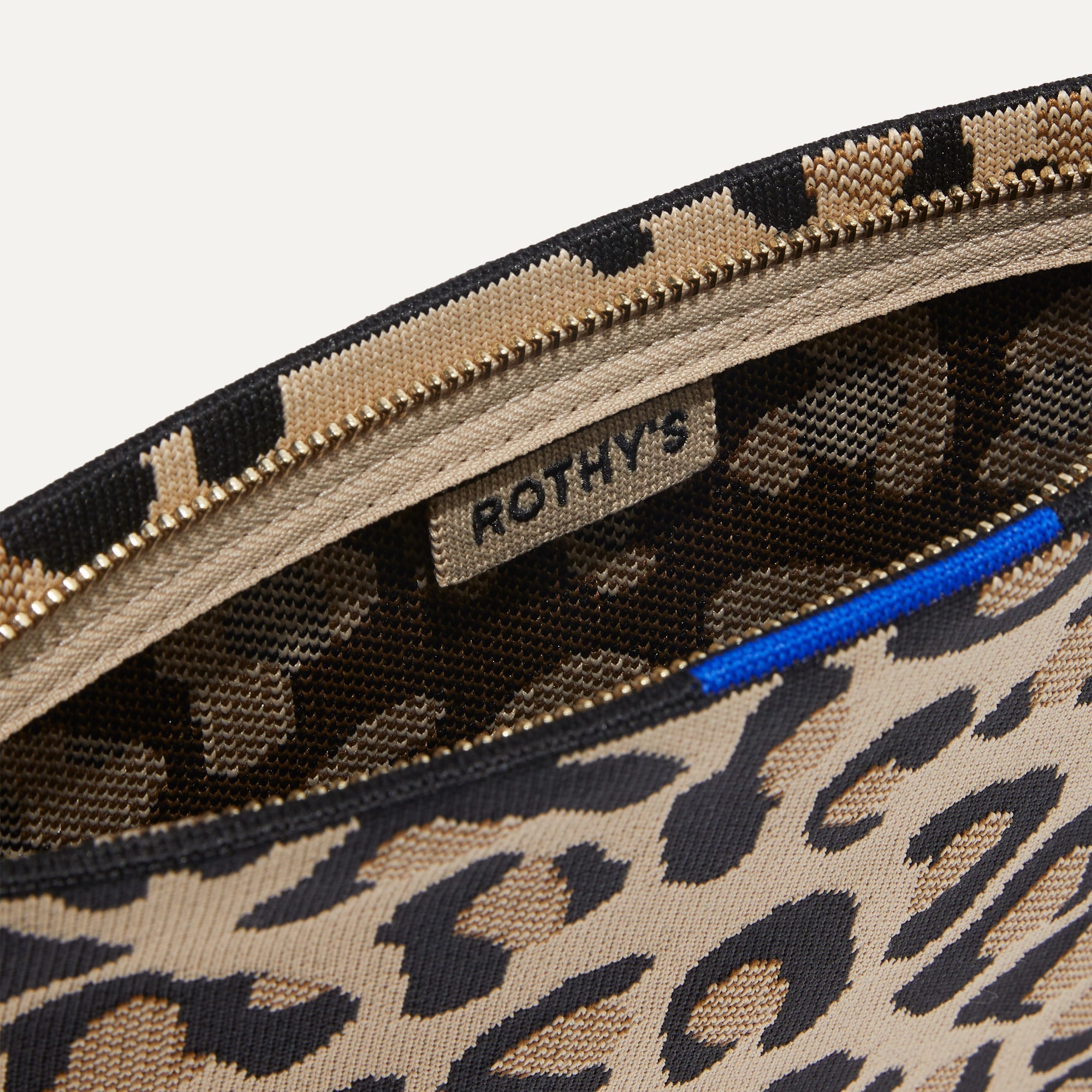 Deals Rothy’s The Wristlet Desert Cat