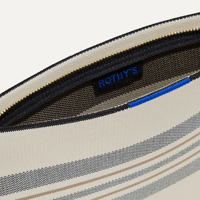 The Wristlet in Polar Stripe interior view with Rothy's halo detail.