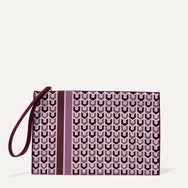 The Wristlet in Signature Plum shown from the front. 