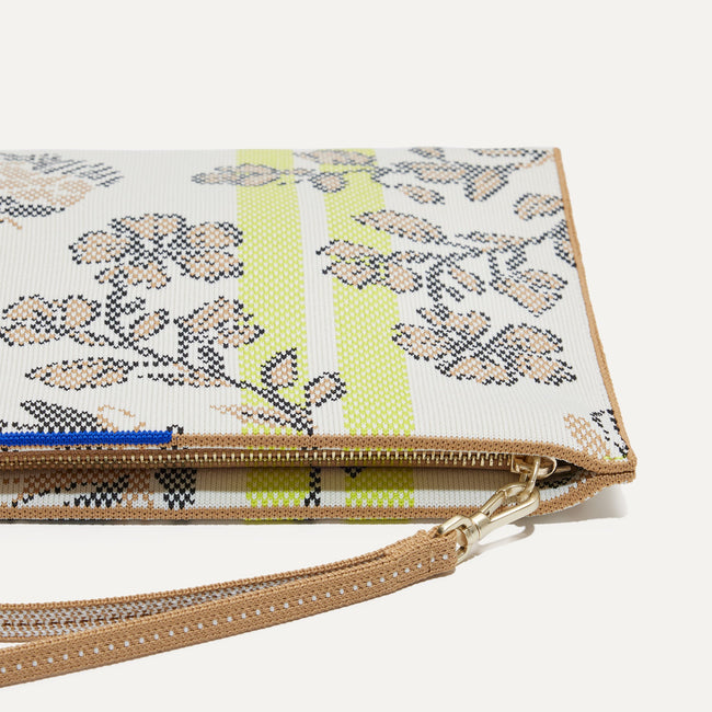Close up of the zipper closure and wrist strap of The Wristlet in Spring Bouquet.