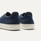 Close up of the heel of The RS02 Sneaker in Navy, with the padded ankle collar and Rothy's signature blue halo.