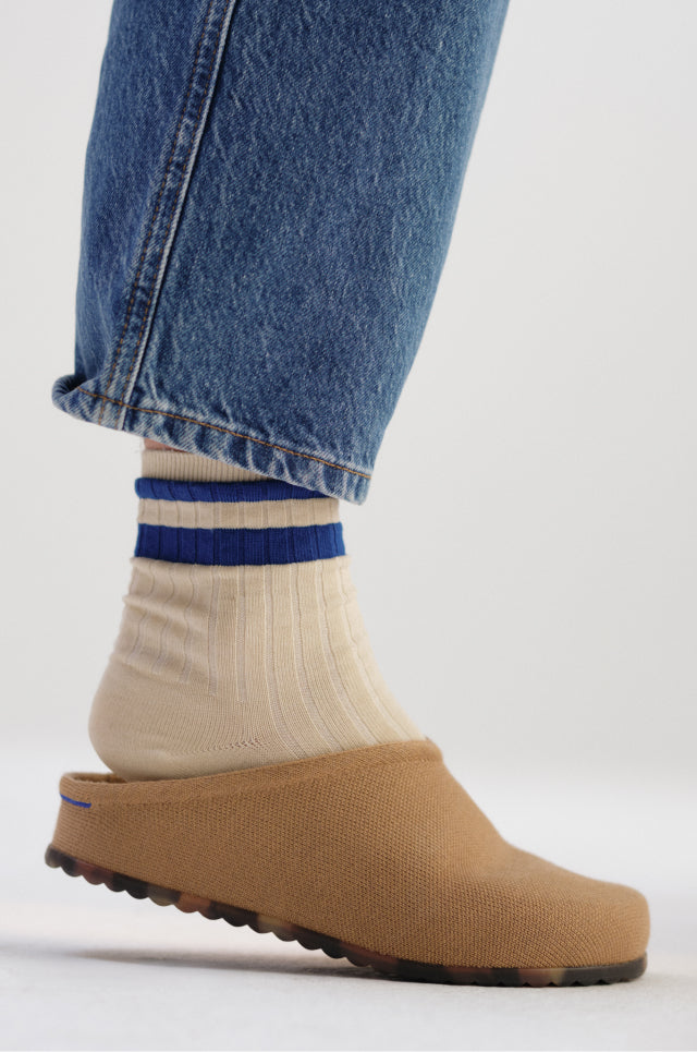 Close up of The Casual Clog in Butternut on model.