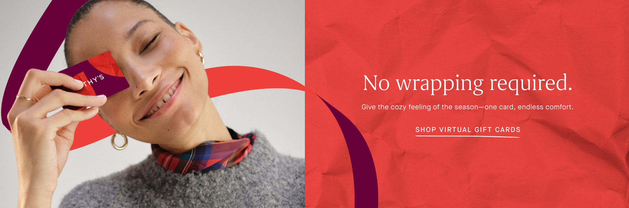 Woman holding a gift card with decorative ribbons on a red background, promoting virtual gift cards.