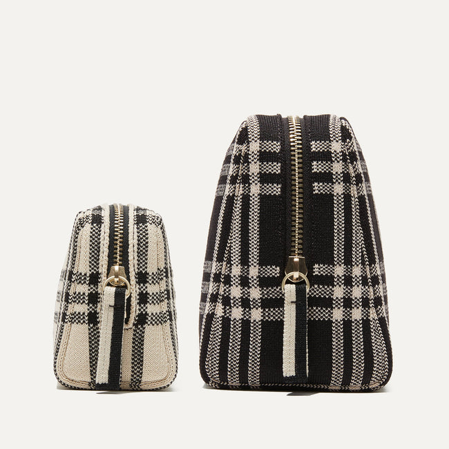 The Universal Pouch Set in Black and Cream Plaid shown from the side.