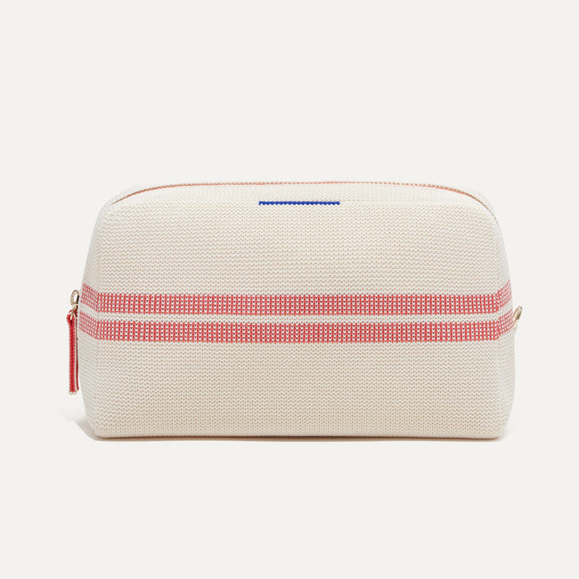 The Universal Pouch in Coral Stripe shown from the front.