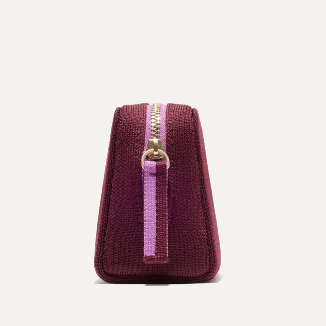 The Mini Universal Pouch in Collegiate Currant shown from the side.