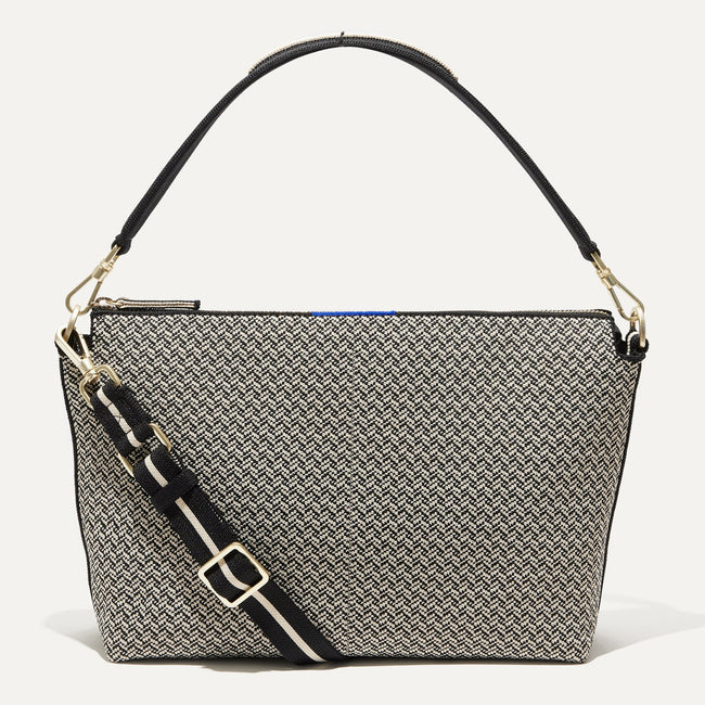 The Daily Crossbody Bag in Black Mist Herringbone shown from the front.