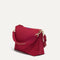 The Daily Crossbody Bag in Cranberry shown at a diagonal view from the left.