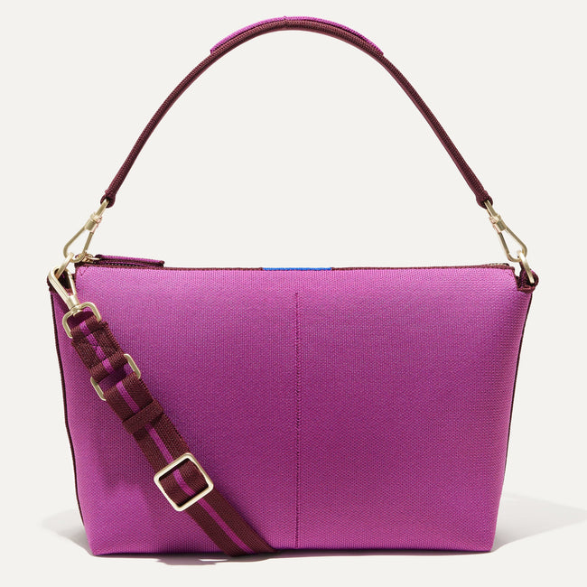 The Daily Crossbody Bag in Soft Orchid shown from the front. 