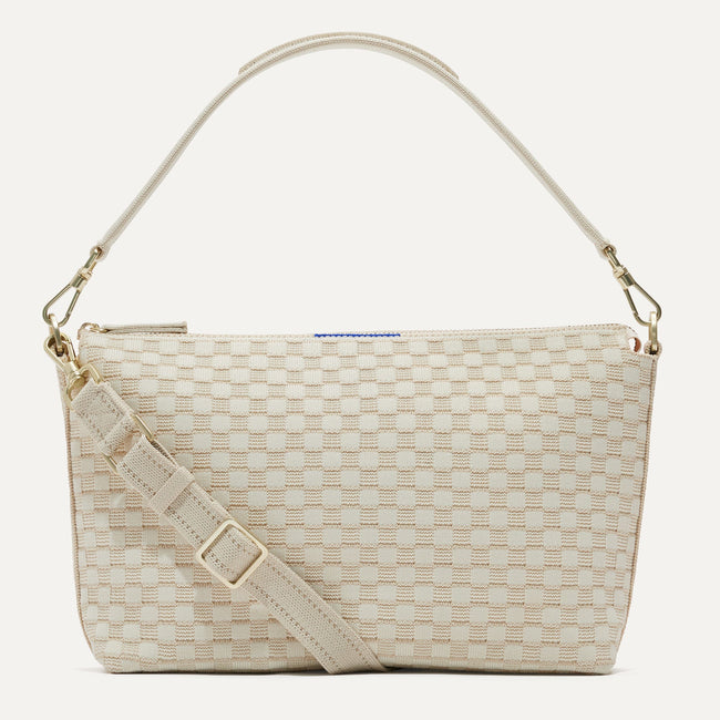 The Daily Crossbody Bag in White Sand shown from the front. 