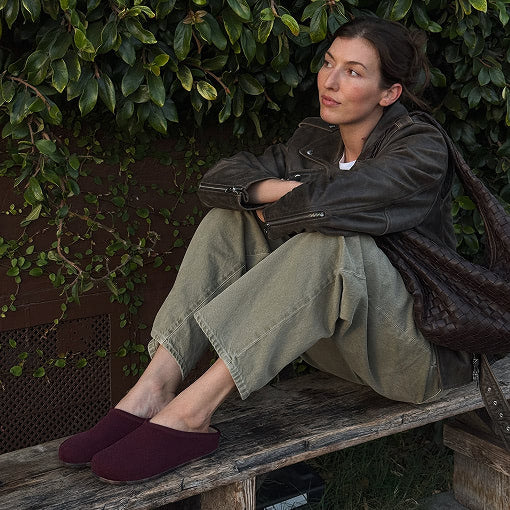 Model wearing The Revelvet Casual Clog in Revelvet Syrah.