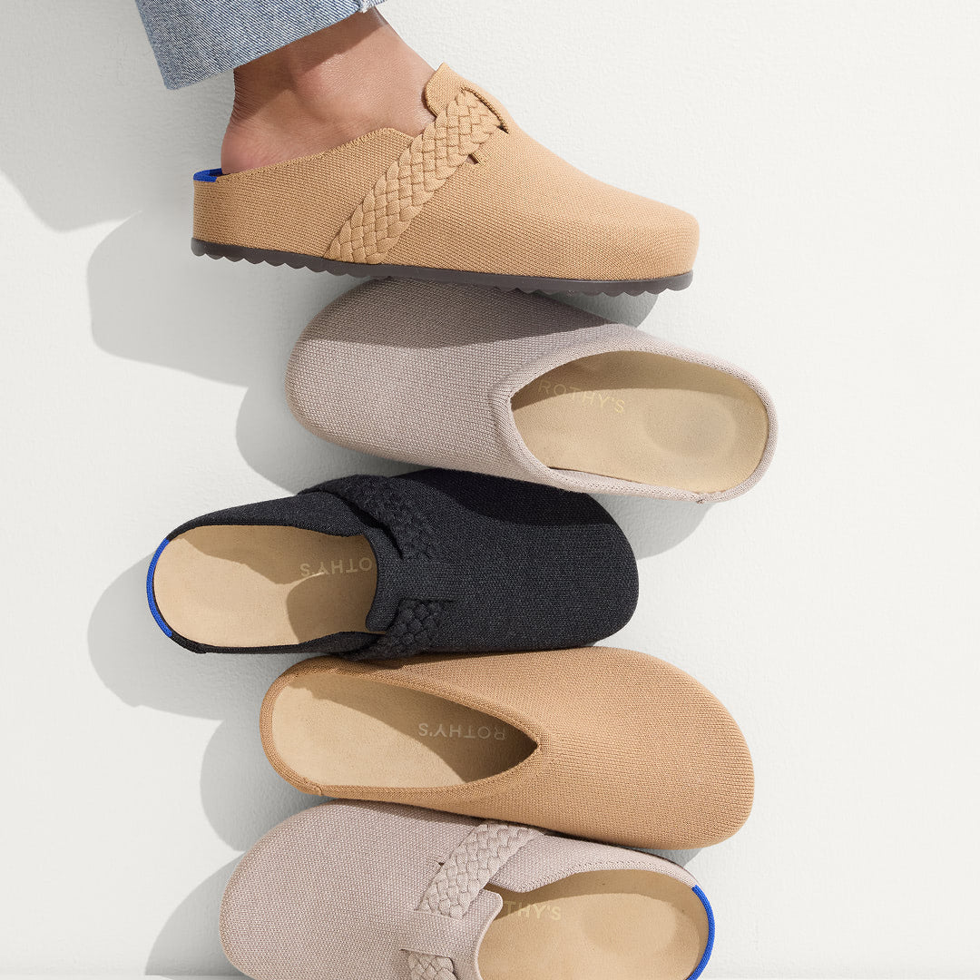 Collection of various Clogs, The Casual Clog in Dove, The Braided Clog in Black.