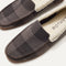 The toe and vamp of The Men's Slipper, in diagonal view.