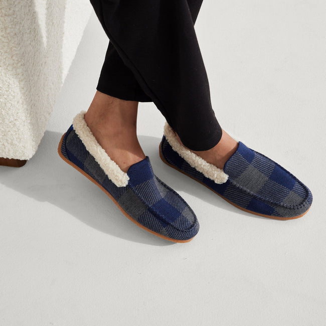 hover | Model wearing The Slipper in Charcoal Blue.