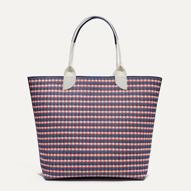 The reverse side of The Lightweight Tote in Navy & Pink Checkers shown from the front.