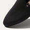 Close up of the toe and vamp of The Almond Loafer in Black. 