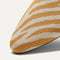 Close up of the toe and vamp of The Almond Loafer in Brown Zebra. 