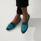 hover | Model wearing The Almond Loafer in Dark Jade. 
