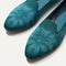 Close up of the toe and vamp of The Almond Loafer in Dark Jade. 