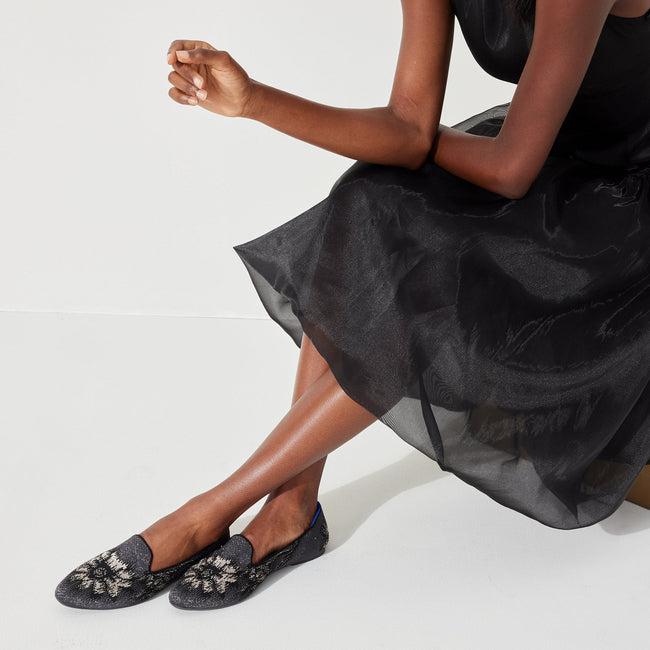hover | Model wearing The Almond Loafer in Obsidian. 