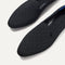 Close up of the toe and vamp of The Almond Loafer in Quilted Black. 