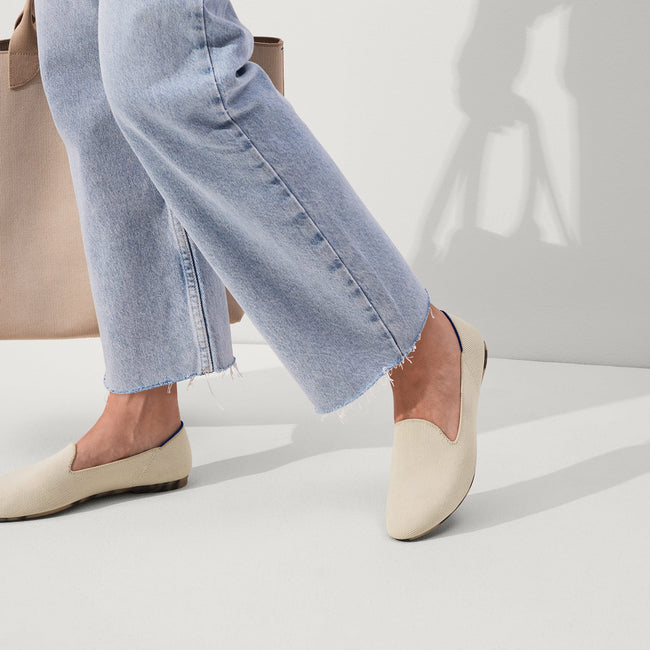 hover | Model wearing The Almond Loafer in Vanilla Bean.