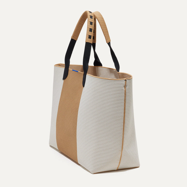 The Lightweight Mega Tote in Camel Colorblock, shown from the side.