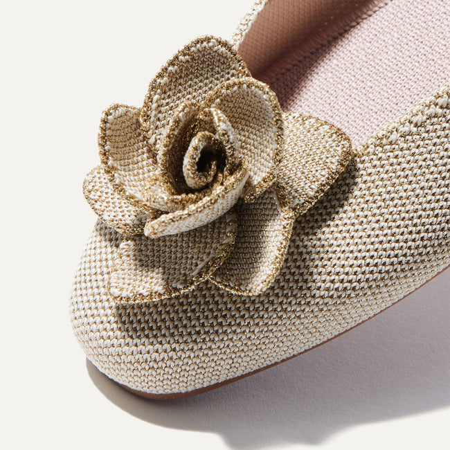 Close up of the square-shaped toe and rounded vamp of The Petal Square in Light Gold Metallic.